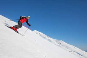 skier on steep slope