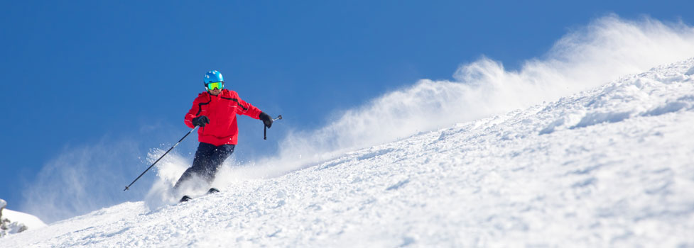 skier on winter slope