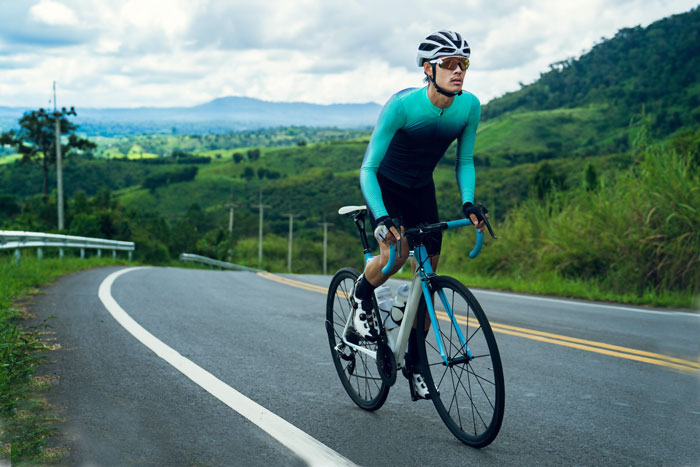 Cyclist on mountain road